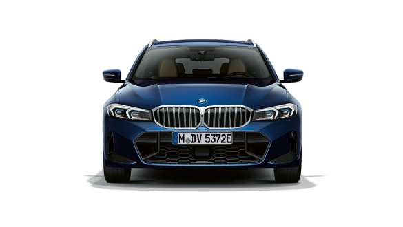 BMW Série 3 Touring LCI G21 vue avant à l'arrêt BMW Série 3 Touring LCI G21 Tansanitblau II vue avant à l’arrêt