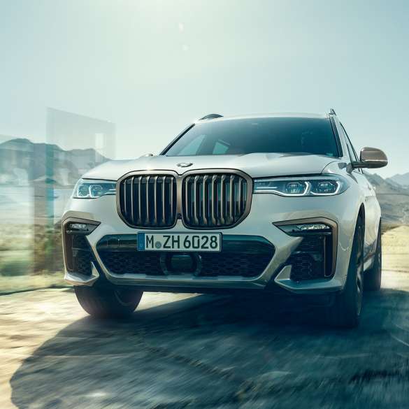 BMW X7 M50d SUV, vue avant. BMW X7 M50d SUV en Mineralweiß, vue avant, G07, 2019
