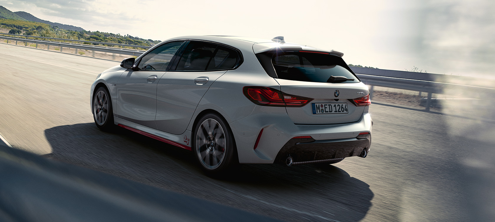 BMW 1er 128ti F40, Dreiviertel-Heckansicht BMW 1er 128ti F40, Dreiviertel-Heckansicht fahrend