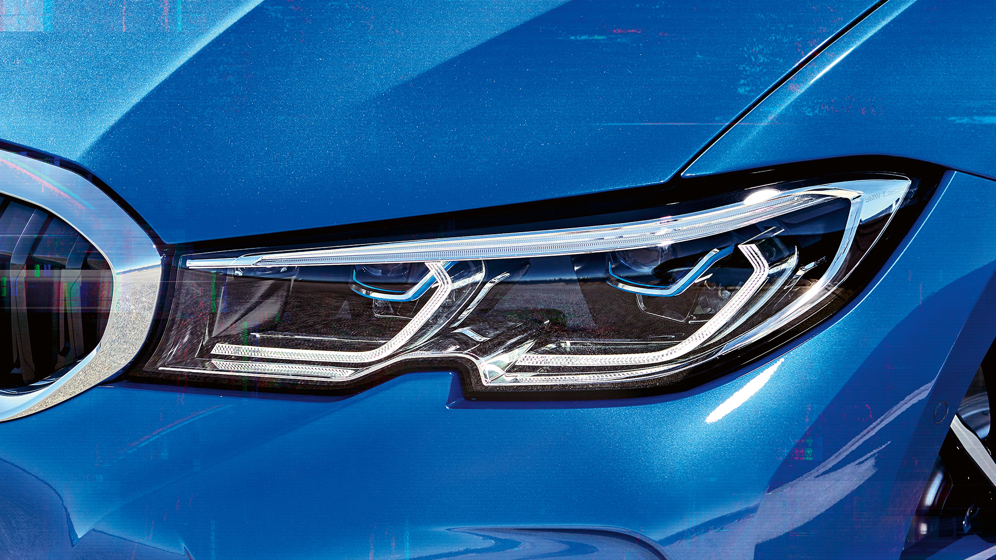 BMW Série 3 Berline, BMW Laserlight G20. Gros plan latéral du phare avant droit avec BMW Laserlight G20.