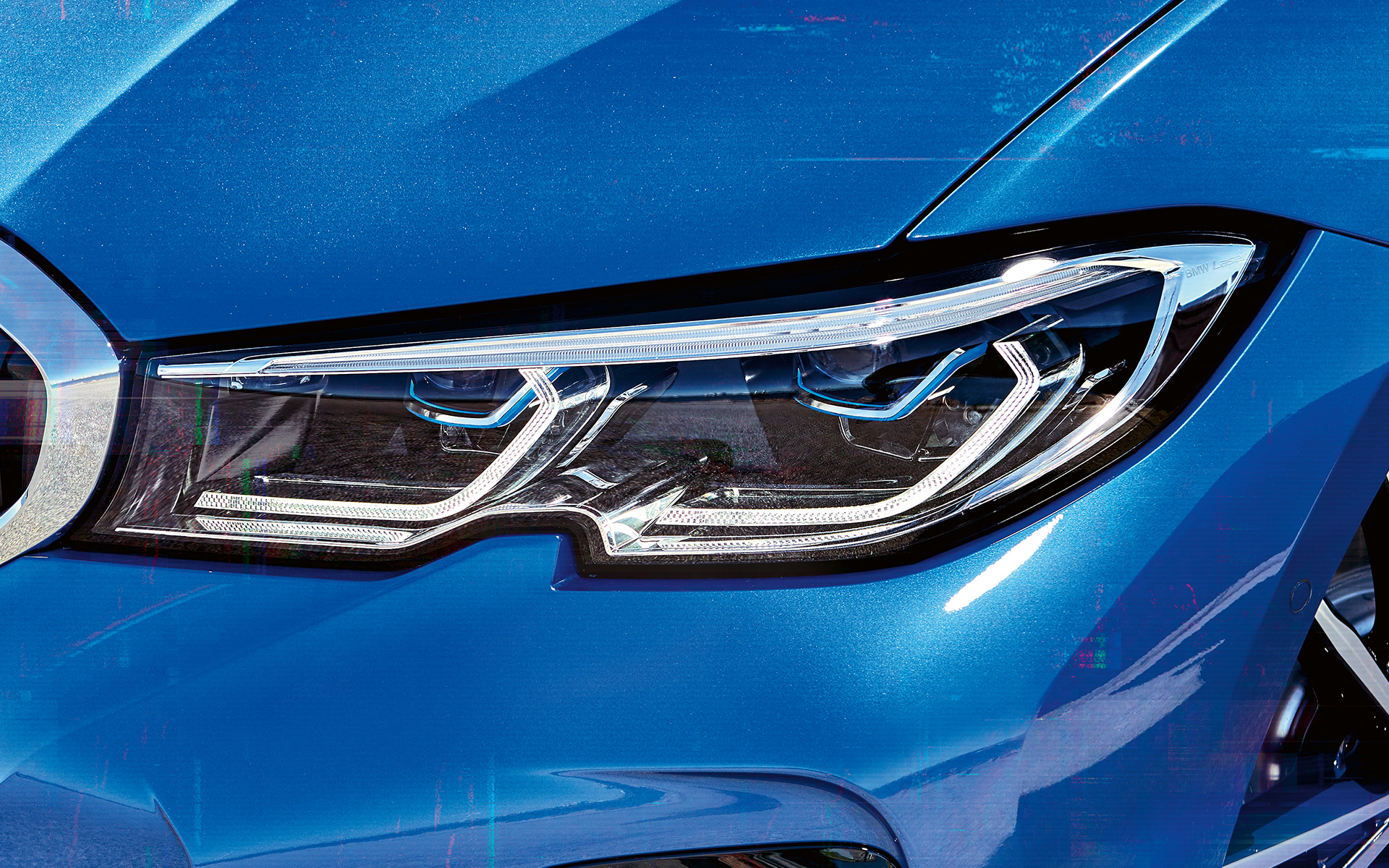 BMW Série 3 Berline (G20), BMW Laserlight. BMW Série 3 Berline (G20), BMW Laserlight. Gros plan latéral du phare avant droit avec BMW Laserlight.