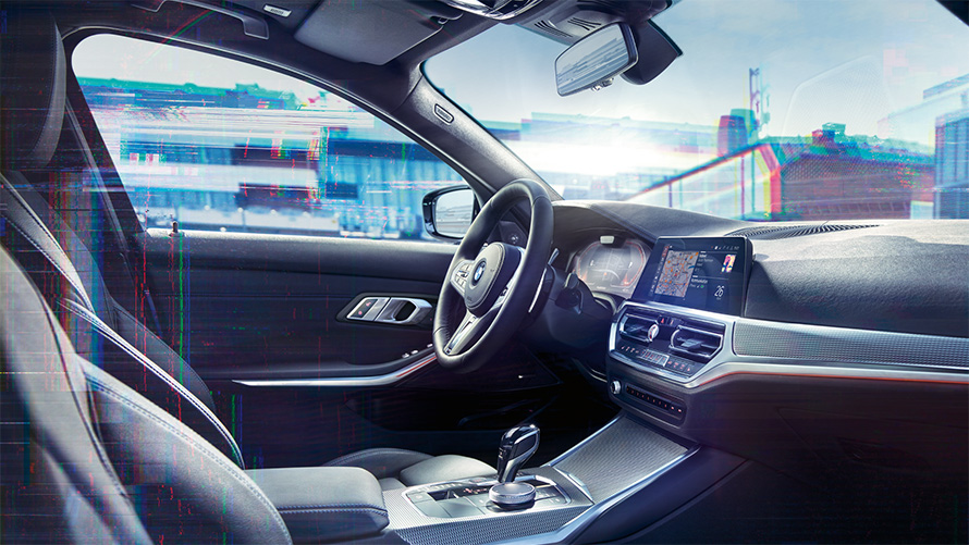  Nahaufnahme des Innenraums der BMW 3er Limousine (G20) mit BMW Live Cockpit Professional.