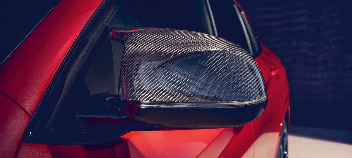 BMW X4 M Competition, Spiegelkappen aus Carbon. F98 BMW X4 M Competition in Toronto Rot metallic, Exterieur, M Carbon Exterieurpaket, Spiegelkappen aus Carbon. F98