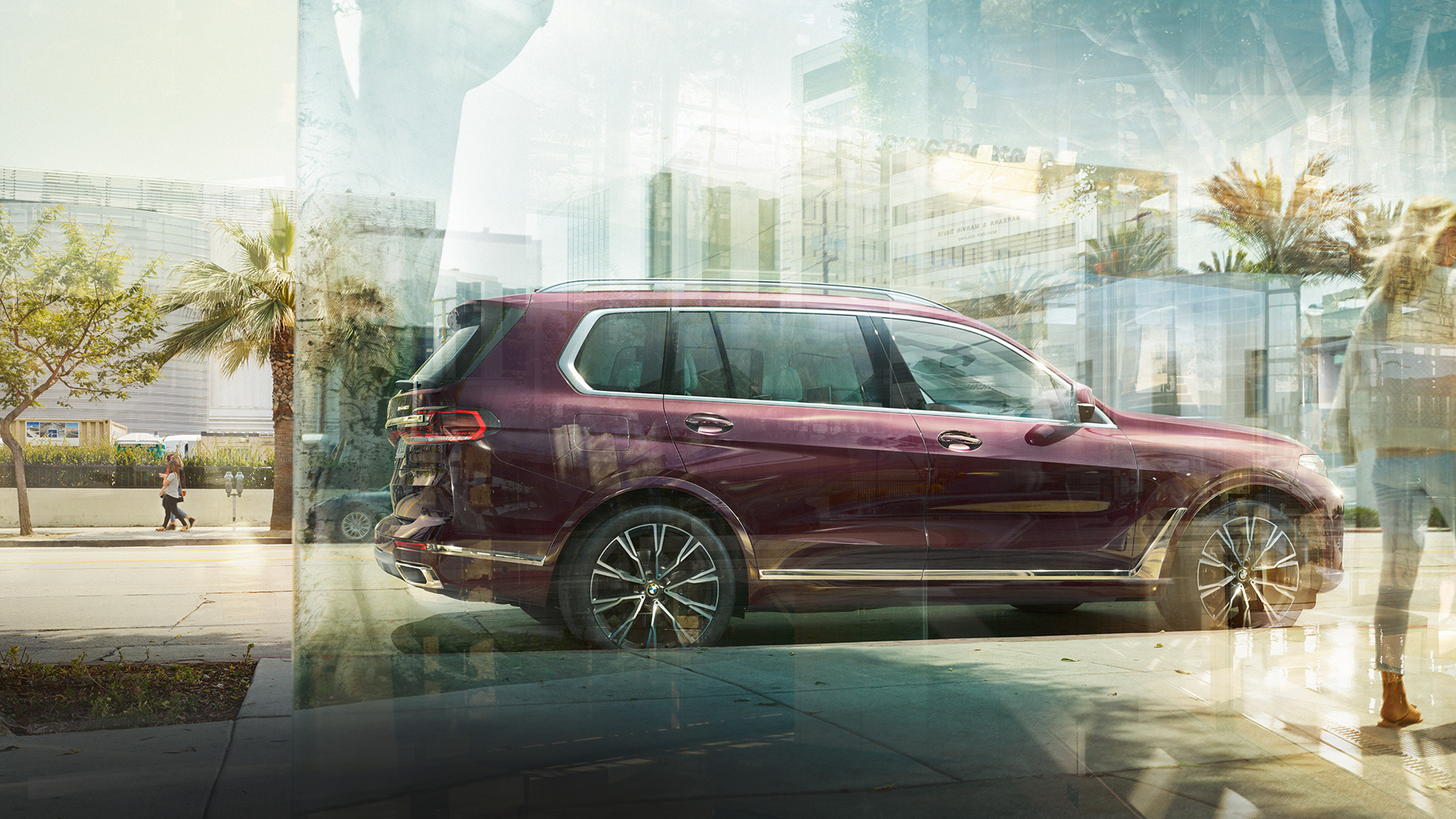 BMW Individual X7 xDrive40i, Seitenansicht G07 Stehender BMW X7 in Ametrin Metallic aus der Seitenansicht G07