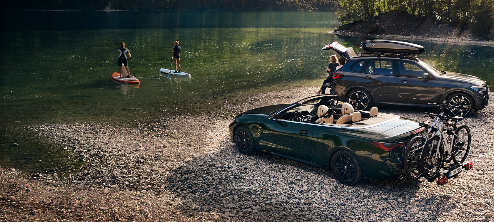 BMW Fahrzeuge vor See und Berglandschaft BMW Frühlings- und Sommerzubehör BMW Fahrzeuge vor See und Berglandschaft