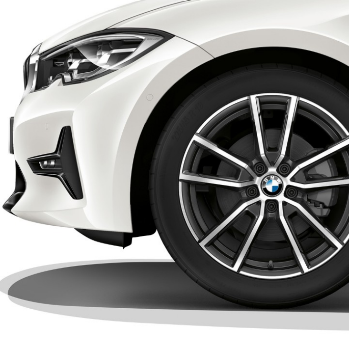 BMW 3er Limousine, Modell Sport Line Leichtmetallrad Nahaufnahme des Leichtmetallrads der BMW 3er Limousine mit der Ausstattung des Modells Sport Line.