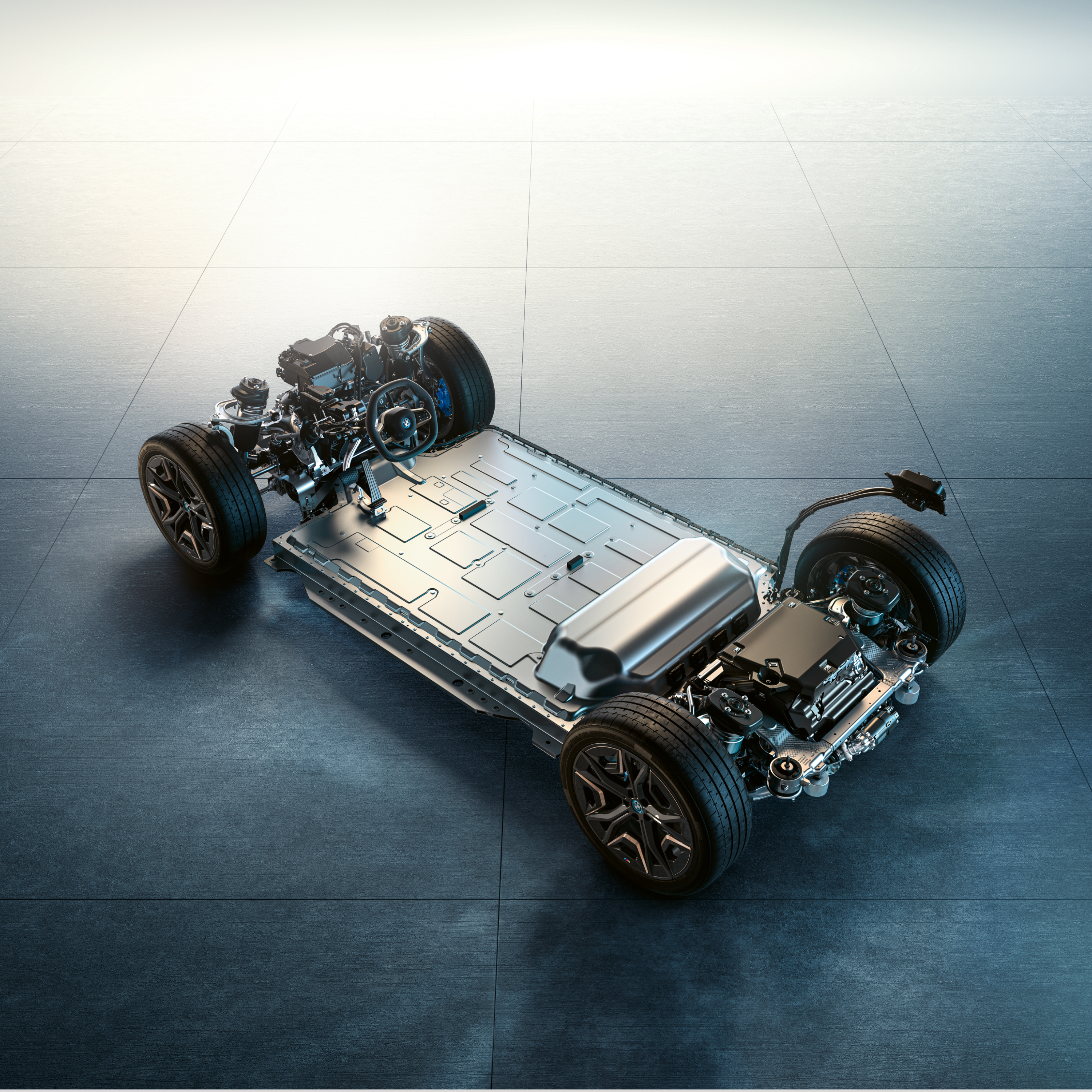 Vue inférieure démontée d’une BMW avec l’emplacement de la batterie